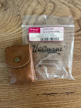 thirty-one caramel brown pebble leather holster with snap